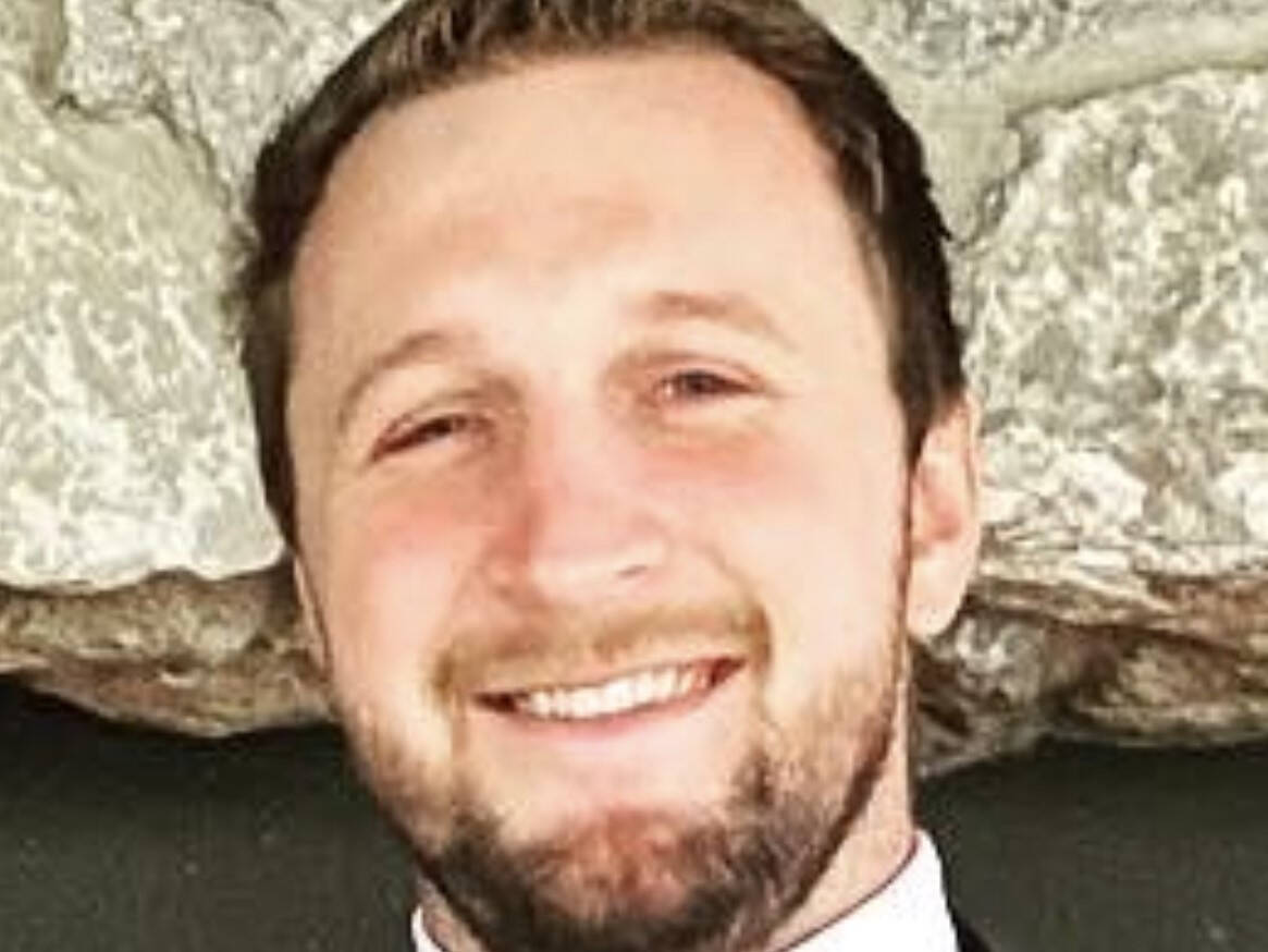 Headshot of graduate student Mitchell Olszewski.